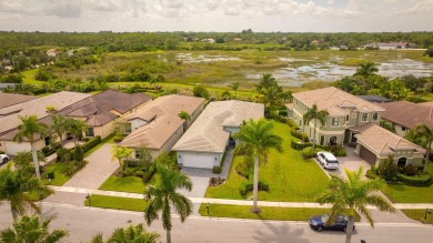 This 2022 built home sits on the preserve with incredible views on Ibis Golf and Country Club in Florida - for sale on GolfHomes.com, golf home, golf lot