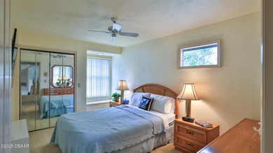 Contemporary, two story brick home has elegance and style on Spruce Creek Golf Club in Florida - for sale on GolfHomes.com, golf home, golf lot