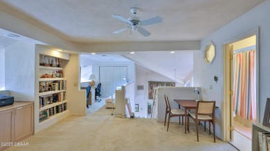 Contemporary, two story brick home has elegance and style on Spruce Creek Golf Club in Florida - for sale on GolfHomes.com, golf home, golf lot