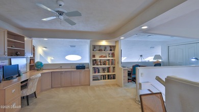 Contemporary, two story brick home has elegance and style on Spruce Creek Golf Club in Florida - for sale on GolfHomes.com, golf home, golf lot