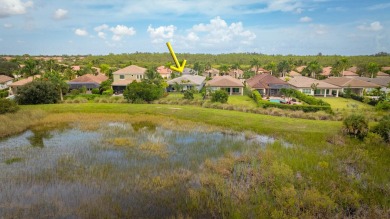 This 2022 built home sits on the preserve with incredible views on Ibis Golf and Country Club in Florida - for sale on GolfHomes.com, golf home, golf lot