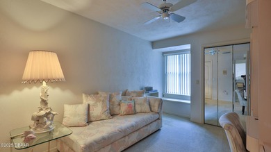 Contemporary, two story brick home has elegance and style on Spruce Creek Golf Club in Florida - for sale on GolfHomes.com, golf home, golf lot