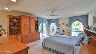 Contemporary, two story brick home has elegance and style on Spruce Creek Golf Club in Florida - for sale on GolfHomes.com, golf home, golf lot