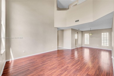Discover elegance in this exquisite 4-bed/2.5-bath home in on Grand Palms Hotel and Golf Resort in Florida - for sale on GolfHomes.com, golf home, golf lot