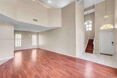 Discover elegance in this exquisite 4-bed/2.5-bath home in on Grand Palms Hotel and Golf Resort in Florida - for sale on GolfHomes.com, golf home, golf lot
