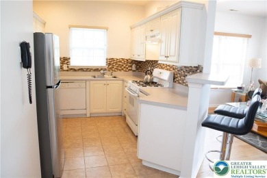 First floor end unit 2 bedroom, 2 bath condo with no stairs on The Club At Morgan Hill in Pennsylvania - for sale on GolfHomes.com, golf home, golf lot