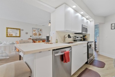 Beautifully maintained 2-bed, 2-bath condo with spacious open on Inverrary Country Club in Florida - for sale on GolfHomes.com, golf home, golf lot