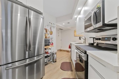 Beautifully maintained 2-bed, 2-bath condo with spacious open on Inverrary Country Club in Florida - for sale on GolfHomes.com, golf home, golf lot
