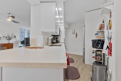Beautifully maintained 2-bed, 2-bath condo with spacious open on Inverrary Country Club in Florida - for sale on GolfHomes.com, golf home, golf lot