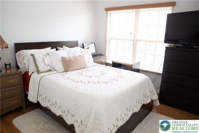First floor end unit 2 bedroom, 2 bath condo with no stairs on The Club At Morgan Hill in Pennsylvania - for sale on GolfHomes.com, golf home, golf lot