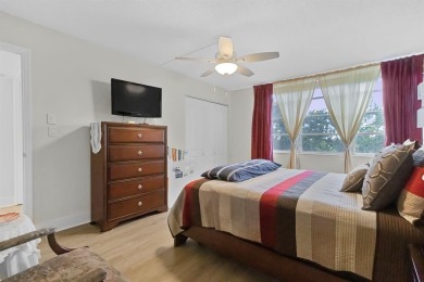 Beautifully maintained 2-bed, 2-bath condo with spacious open on Inverrary Country Club in Florida - for sale on GolfHomes.com, golf home, golf lot