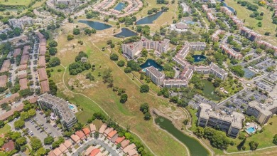 Beautifully maintained 2-bed, 2-bath condo with spacious open on Inverrary Country Club in Florida - for sale on GolfHomes.com, golf home, golf lot