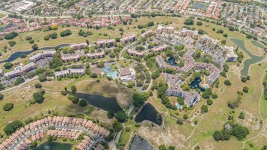 Beautifully maintained 2-bed, 2-bath condo with spacious open on Inverrary Country Club in Florida - for sale on GolfHomes.com, golf home, golf lot
