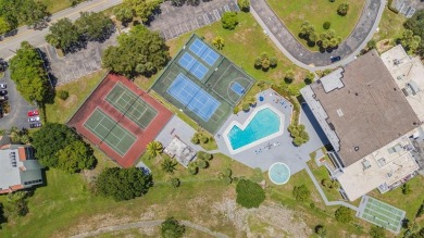Beautifully maintained 2-bed, 2-bath condo with spacious open on Inverrary Country Club in Florida - for sale on GolfHomes.com, golf home, golf lot