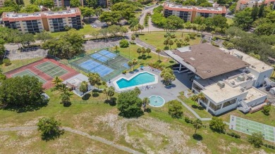 Beautifully maintained 2-bed, 2-bath condo with spacious open on Inverrary Country Club in Florida - for sale on GolfHomes.com, golf home, golf lot