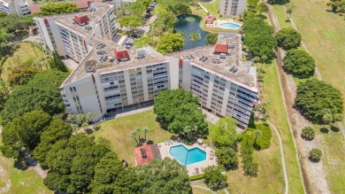 Beautifully maintained 2-bed, 2-bath condo with spacious open on Inverrary Country Club in Florida - for sale on GolfHomes.com, golf home, golf lot