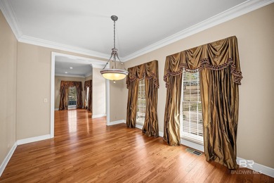 Nestled in one of Monroeville's most established neighborhoods on Vanity Fair Golf and Tennis Club in Alabama - for sale on GolfHomes.com, golf home, golf lot