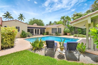 Set on an oversized 17,100-square-foot lot, nestled just around on Granada Golf Club in Florida - for sale on GolfHomes.com, golf home, golf lot