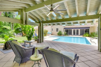 Set on an oversized 17,100-square-foot lot, nestled just around on Granada Golf Club in Florida - for sale on GolfHomes.com, golf home, golf lot