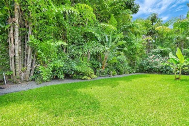 Set on an oversized 17,100-square-foot lot, nestled just around on Granada Golf Club in Florida - for sale on GolfHomes.com, golf home, golf lot
