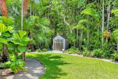 Set on an oversized 17,100-square-foot lot, nestled just around on Granada Golf Club in Florida - for sale on GolfHomes.com, golf home, golf lot