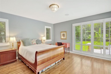 Set on an oversized 17,100-square-foot lot, nestled just around on Granada Golf Club in Florida - for sale on GolfHomes.com, golf home, golf lot