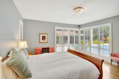 Set on an oversized 17,100-square-foot lot, nestled just around on Granada Golf Club in Florida - for sale on GolfHomes.com, golf home, golf lot