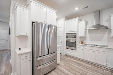 Move In Ready - More for your Money!  The Kensington Plan with on Savannah Quarters Country Club in Georgia - for sale on GolfHomes.com, golf home, golf lot