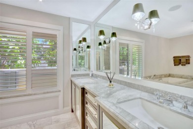 Set on an oversized 17,100-square-foot lot, nestled just around on Granada Golf Club in Florida - for sale on GolfHomes.com, golf home, golf lot