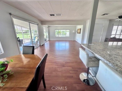 Beautiful home in Date Palm Country Club on the 14th hole of the on Date Palm Country Club in California - for sale on GolfHomes.com, golf home, golf lot