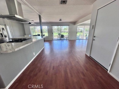 Beautiful home in Date Palm Country Club on the 14th hole of the on Date Palm Country Club in California - for sale on GolfHomes.com, golf home, golf lot