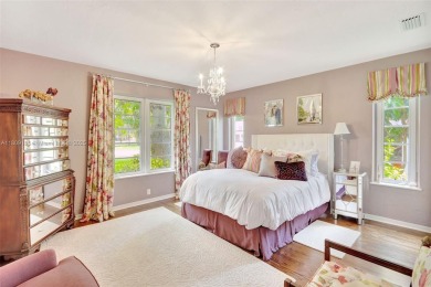 Set on an oversized 17,100-square-foot lot, nestled just around on Granada Golf Club in Florida - for sale on GolfHomes.com, golf home, golf lot