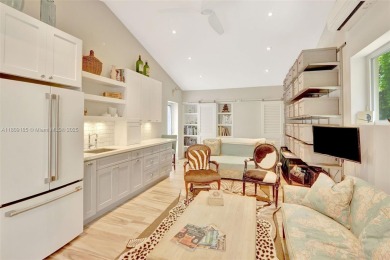 Set on an oversized 17,100-square-foot lot, nestled just around on Granada Golf Club in Florida - for sale on GolfHomes.com, golf home, golf lot