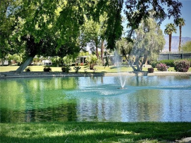 Beautiful home in Date Palm Country Club on the 14th hole of the on Date Palm Country Club in California - for sale on GolfHomes.com, golf home, golf lot