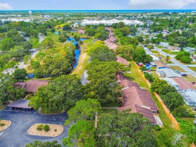 HOME SWEET HOME ....Tucked inside Hudson's welcoming Beacon on Beacon Woods Golf Club in Florida - for sale on GolfHomes.com, golf home, golf lot