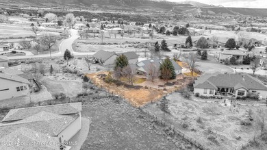 Welcome to this beautifully designed 4-bedroom, 2-bath home on Battlement Mesa Golf Course in Colorado - for sale on GolfHomes.com, golf home, golf lot