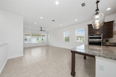 Stunning Move-In Ready Townhome in the Prestigious Gated on Eagle Creek Golf Club in Florida - for sale on GolfHomes.com, golf home, golf lot