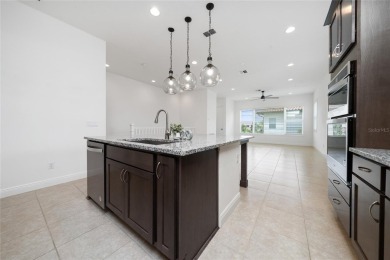 Stunning Move-In Ready Townhome in the Prestigious Gated on Eagle Creek Golf Club in Florida - for sale on GolfHomes.com, golf home, golf lot