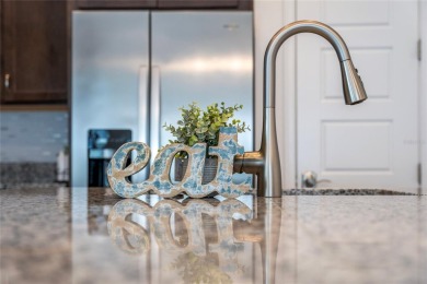 Stunning Move-In Ready Townhome in the Prestigious Gated on Eagle Creek Golf Club in Florida - for sale on GolfHomes.com, golf home, golf lot