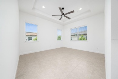 Stunning Move-In Ready Townhome in the Prestigious Gated on Eagle Creek Golf Club in Florida - for sale on GolfHomes.com, golf home, golf lot