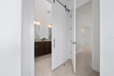 Stunning Move-In Ready Townhome in the Prestigious Gated on Eagle Creek Golf Club in Florida - for sale on GolfHomes.com, golf home, golf lot