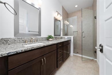Stunning Move-In Ready Townhome in the Prestigious Gated on Eagle Creek Golf Club in Florida - for sale on GolfHomes.com, golf home, golf lot