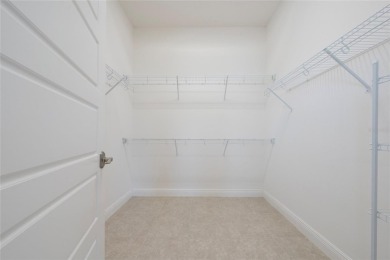 Stunning Move-In Ready Townhome in the Prestigious Gated on Eagle Creek Golf Club in Florida - for sale on GolfHomes.com, golf home, golf lot