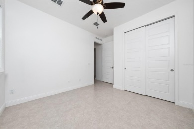 Stunning Move-In Ready Townhome in the Prestigious Gated on Eagle Creek Golf Club in Florida - for sale on GolfHomes.com, golf home, golf lot