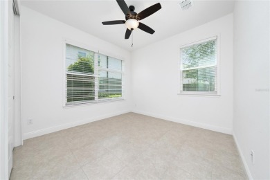 Stunning Move-In Ready Townhome in the Prestigious Gated on Eagle Creek Golf Club in Florida - for sale on GolfHomes.com, golf home, golf lot