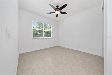 Stunning Move-In Ready Townhome in the Prestigious Gated on Eagle Creek Golf Club in Florida - for sale on GolfHomes.com, golf home, golf lot