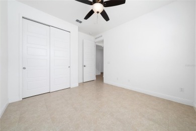 Stunning Move-In Ready Townhome in the Prestigious Gated on Eagle Creek Golf Club in Florida - for sale on GolfHomes.com, golf home, golf lot