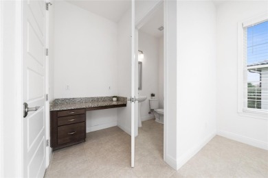 Stunning Move-In Ready Townhome in the Prestigious Gated on Eagle Creek Golf Club in Florida - for sale on GolfHomes.com, golf home, golf lot