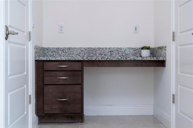 Stunning Move-In Ready Townhome in the Prestigious Gated on Eagle Creek Golf Club in Florida - for sale on GolfHomes.com, golf home, golf lot