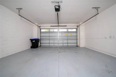 Stunning Move-In Ready Townhome in the Prestigious Gated on Eagle Creek Golf Club in Florida - for sale on GolfHomes.com, golf home, golf lot